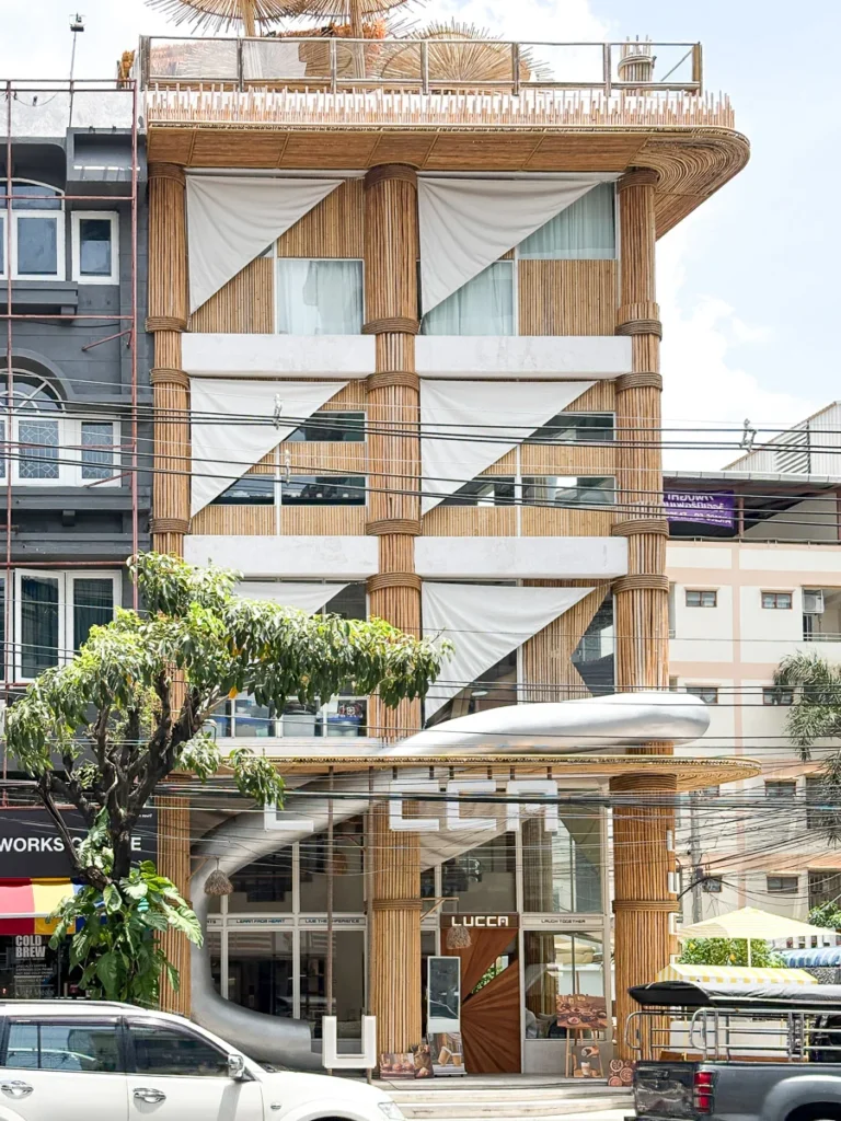A modern lowrise fully decorated in wooden/bamboo facade.