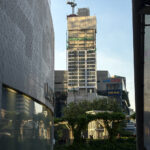 A new Conrad Hotel next to EMsphere mall being constructed as the evening light dye it in yellow tint.