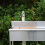 A camp ground water station and dish washing area in Japan.