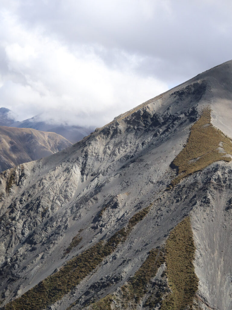 The mountain in canterbury region of New Zealand, the rocky texure sides casting shadows and intricate texture of the mountain.