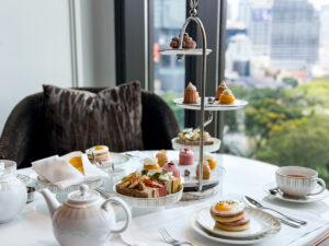 Afternoon Tea set in Bangkok at the Ritz Carlton, window side seat looking down to the road.