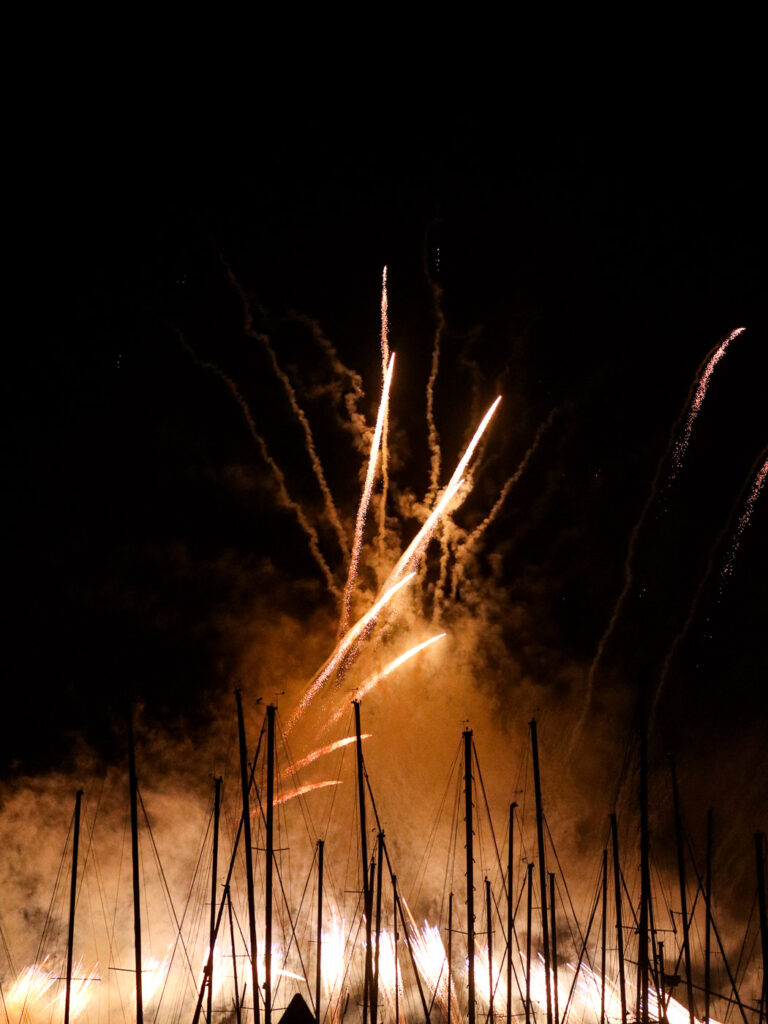 Fireworks creating a fascinating shape over a marina in Okinawa.