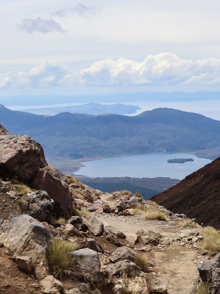 A Part of Lake Taupō around the corner, asserting it dominating presence that coverd most part or the visible view.