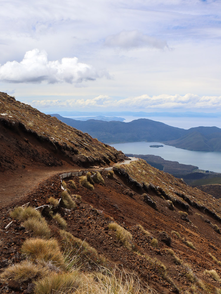 The hiking trail approaching Ketetahi Descent, overlooking the magnificent Lake Taupō in the distance.