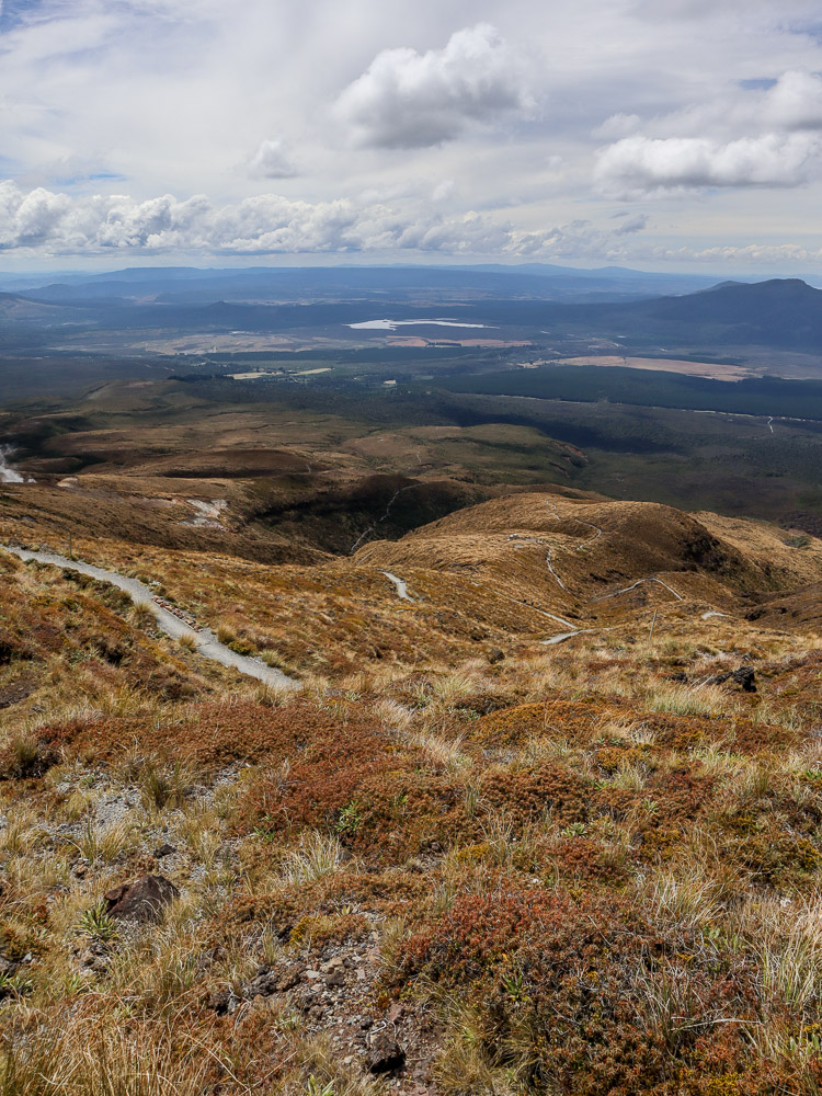 The seemingly never-ending Ketetahi Descent, zigzagging on the way down from Tongariro Alpine Crossing. The exit point visible.