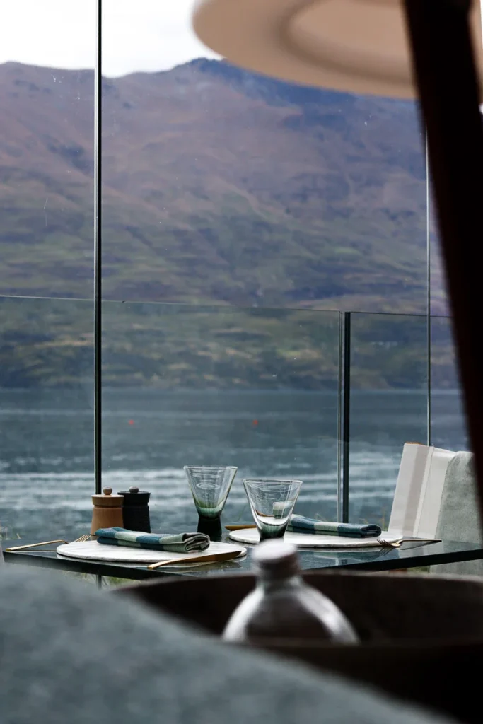 The Terrace Restaurant by ROKI Collection, an elegant luxurious restaurant setting, with a view overlooking the beautiful Waikatipu Lake.