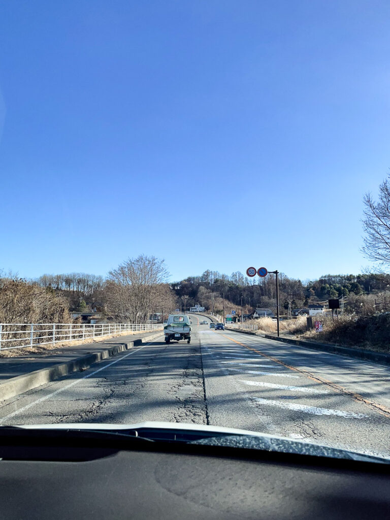 Driving through Japan rural road in the winter, a calming drive on a cold day with gentle sun.