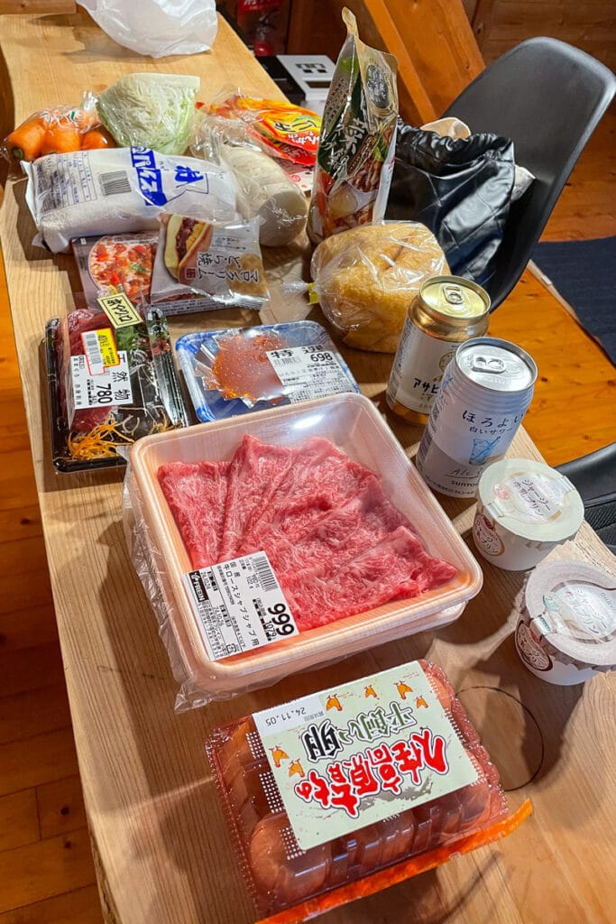 A grocery haul during a trip in Japan, the local food and ingredients of Japan lined up on a table.