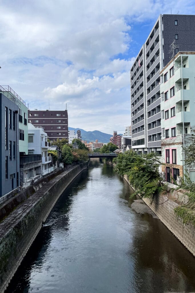 The Riverside area in the city of Kumamoto, the blend of modern apartments living beside nature.