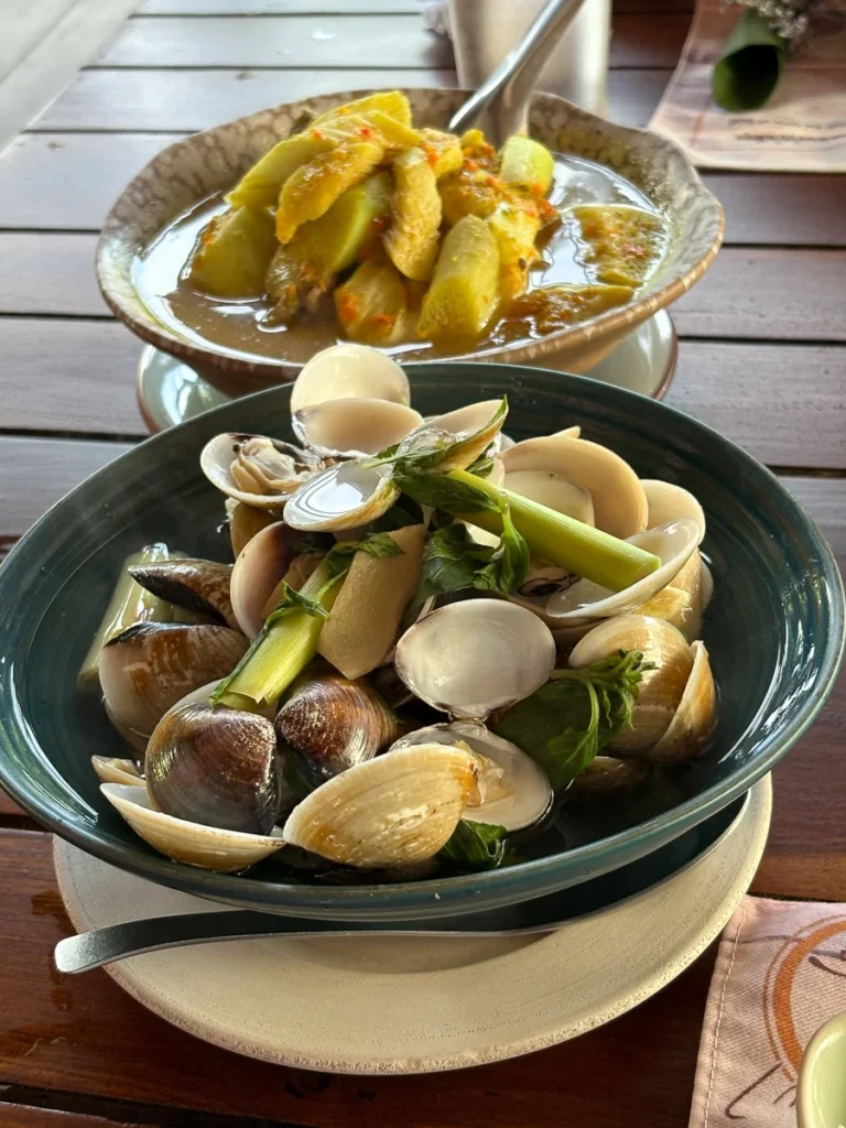 Thai style boil dish and curry at Baan Suan Lung Khai an elevated local cuisine on Samui Island.