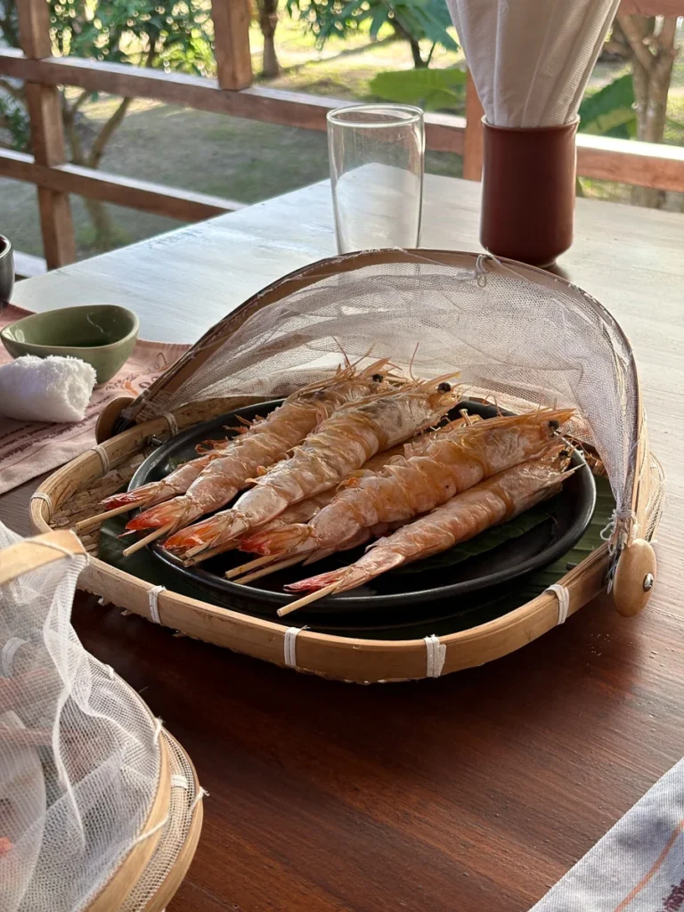 Charcoal Grilled Shrimps at Baan Suan Lung Khai on Koh Samui. A meal at a local michelin guide restaurant.