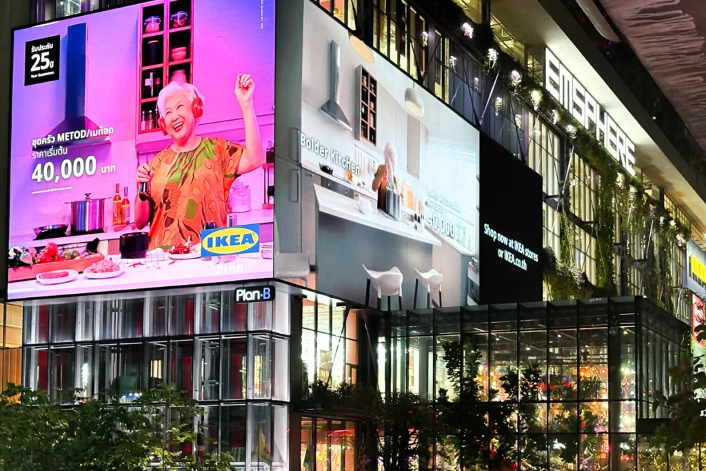 The night life at Emsphere shopping mall. Big LED screens and the dazzling light shining throught the windows lit up Bangkok.