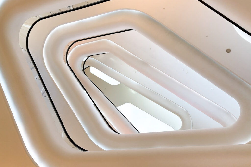 The spiral cut-out on the floors going up at Central Embassy, a clean modern design language.