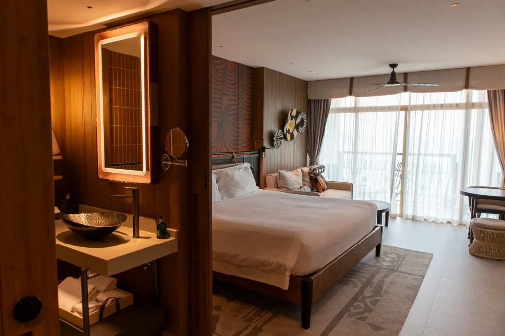 A renovated beach vibe guest room at Centara Grand Mirage Pattaya, a room with orange hue.