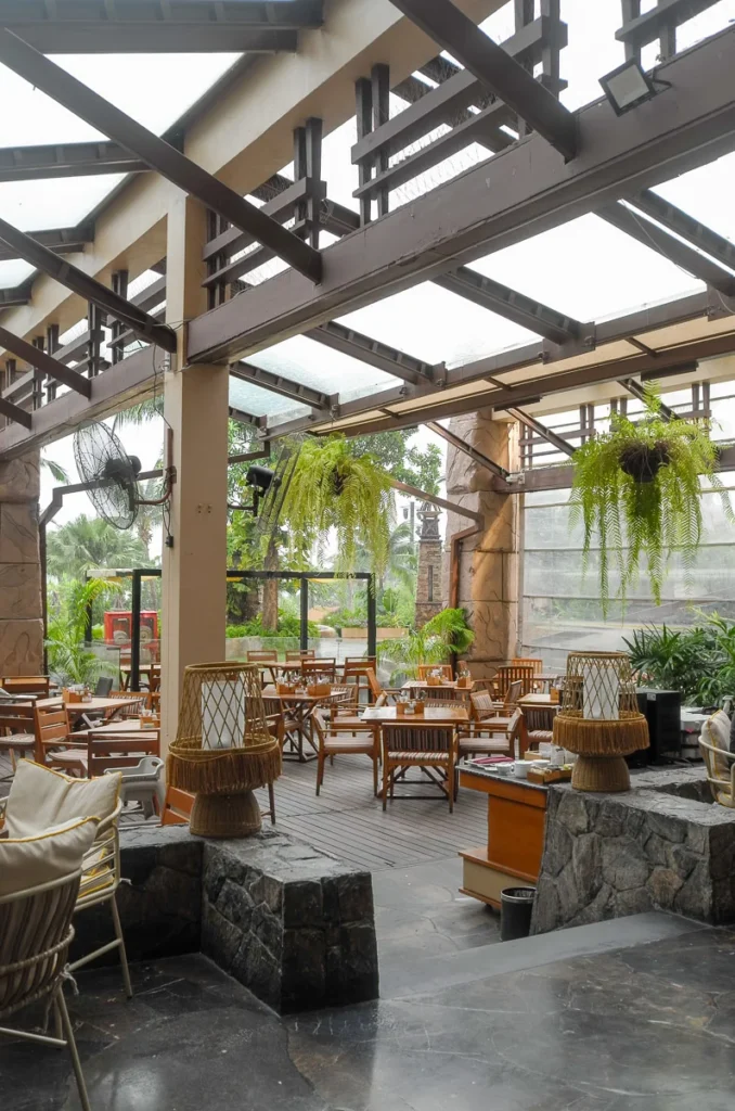 Outdoor dining space during breakfast in the early morning at Centara Grand Mirage Pattaya.