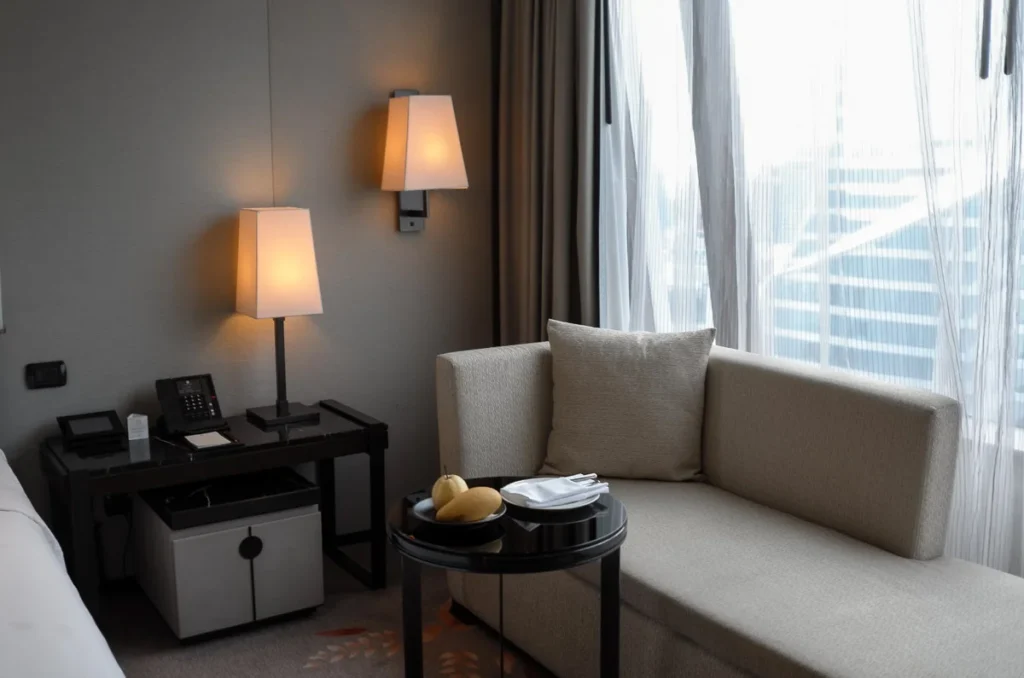 A relaxing corner at Okura Prestige Bangkok Corner room.