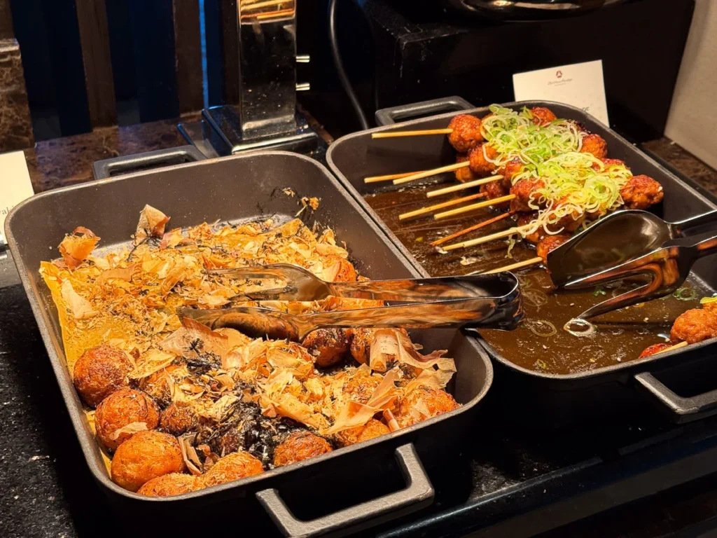 Takoyaki and skewer japanese style meat balls, the warmth of a comfort food at Okura Bangkok Club Lounge.