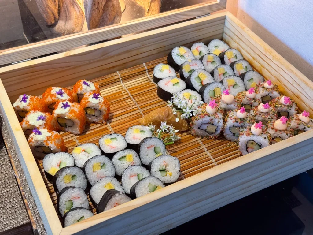 SImple, modern style sushi roll served at evening cocktail time at Okura club lounge in Bangkok.