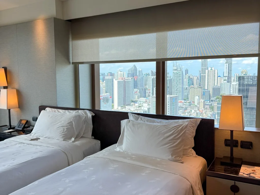 Corner room view from the Okura Prestige Bangkok, an example of what a concrete jungle look like from above.