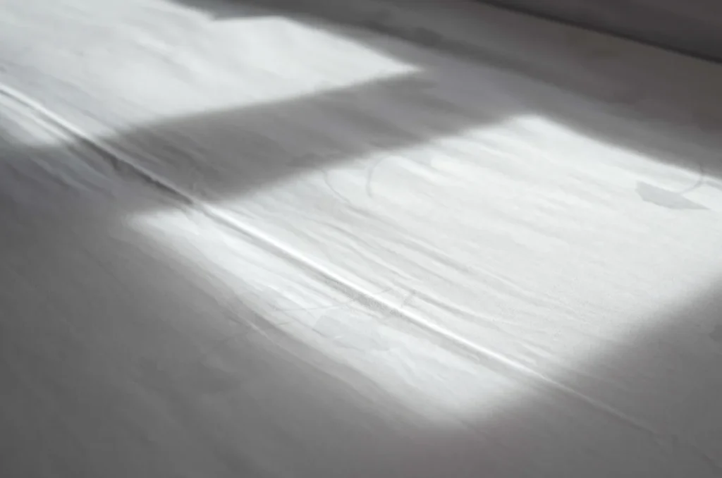 A small detail that matters in a luxury hotel: the bed sheet at Okura Prestige Bangkok decorated with ginkgo leaf.