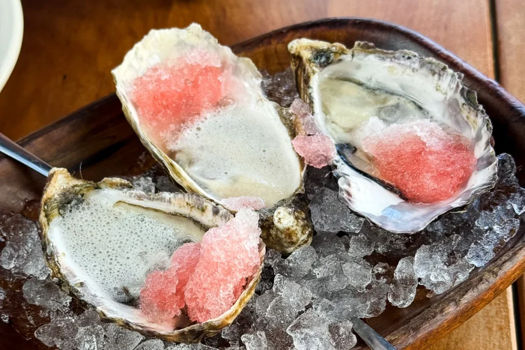 Te Matuku Oyster, fresh bright flavor, at Ahi. Restaurant in Auckland.