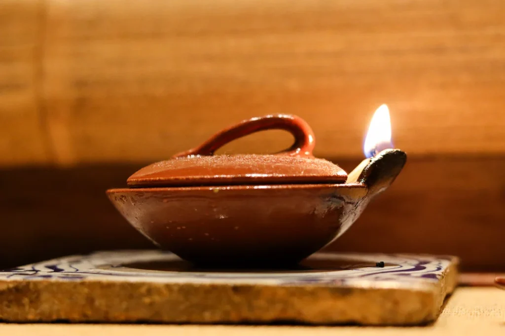 A very old candle clay pot used as decoration at TSUKIOKA, Kyoto.