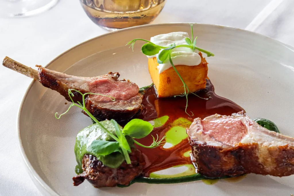 New Zealand Lamb Rack at Mudbrick Vineyard & Restaurant, a gamey meat main course done well.