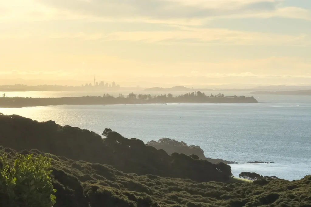 The breathtaking view of Auckland city from Waiheke Island, Mudbrick Vineyard, during sunset.