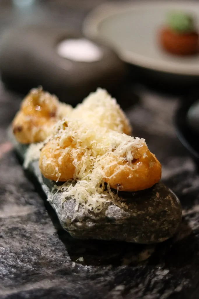 Vintage Cheddar Donut, a sophisticated taste that works well, a snack option at one Michelin star Rātā Restaurant.