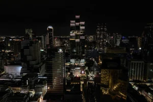 The night cityscape of Silom, Bangkok, where office highrises light up the dark.