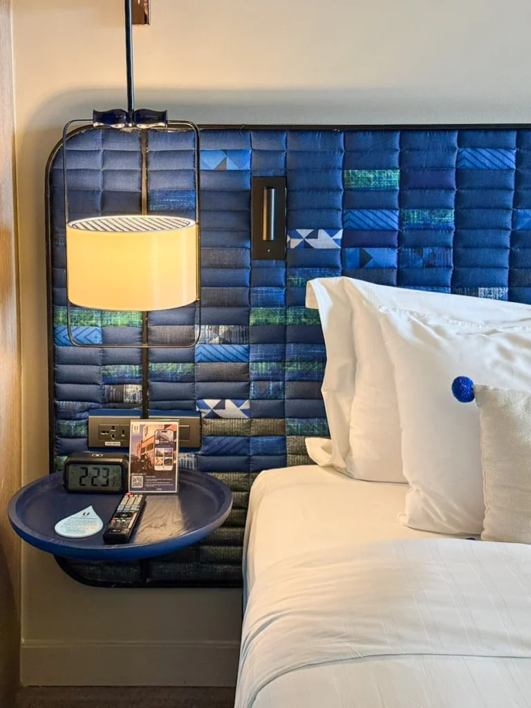 The bedside table and lamb at U Nimman Chiang Mai, a modern with Lanna-inspried design interior.