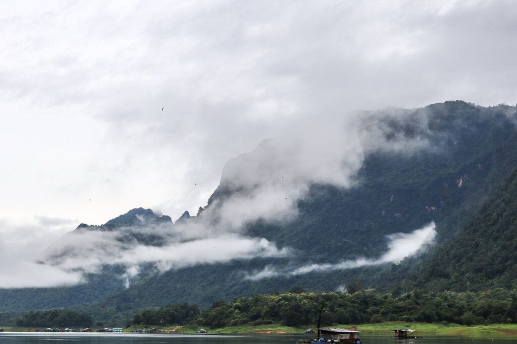 The fog hovering all over the towering mountain at Baan Tao Than, Thong Pha Phum.