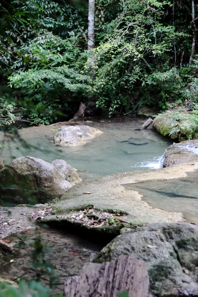 Turquoise blue water of the Erawan falls.