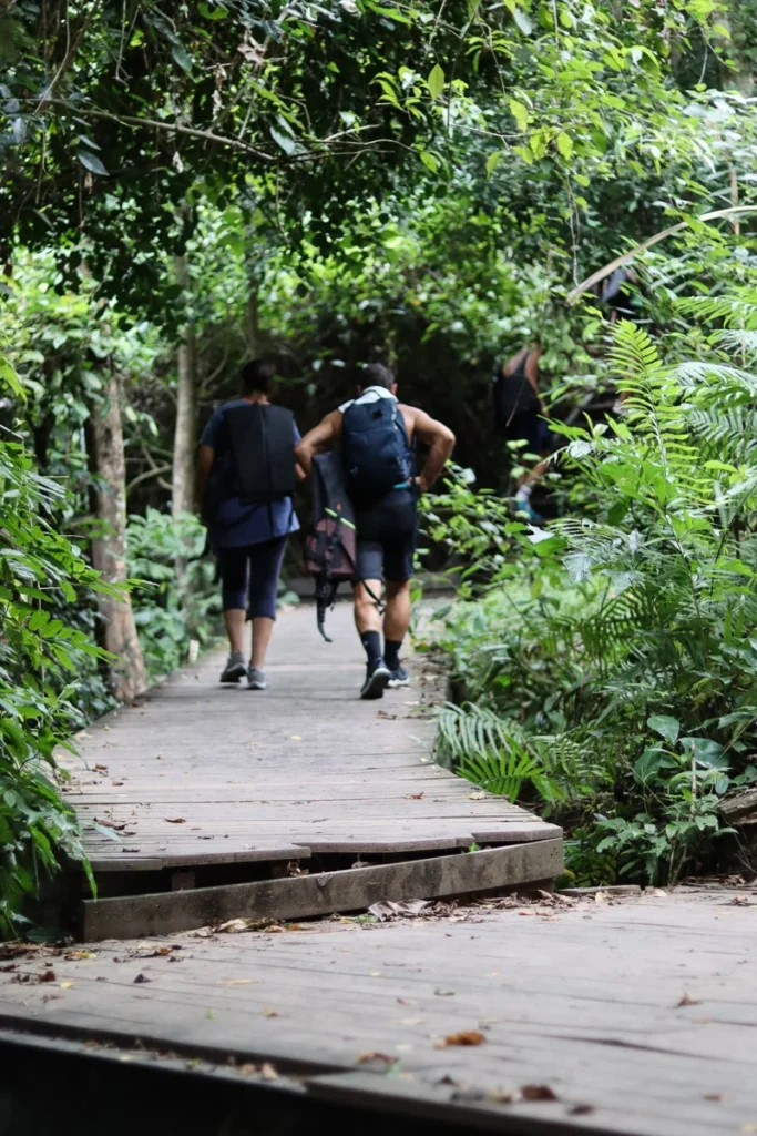 Hikers on the Erawan Falls on a day with good weather.