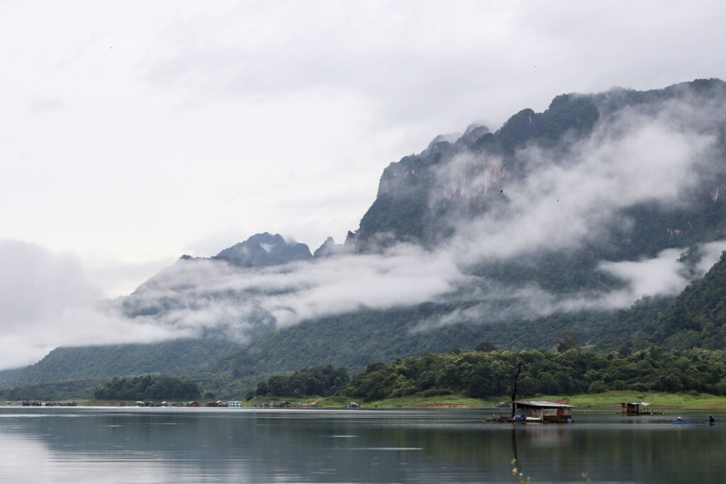 Baan Tao Than in the morning during rainy season with clouds howering lower than the peak.