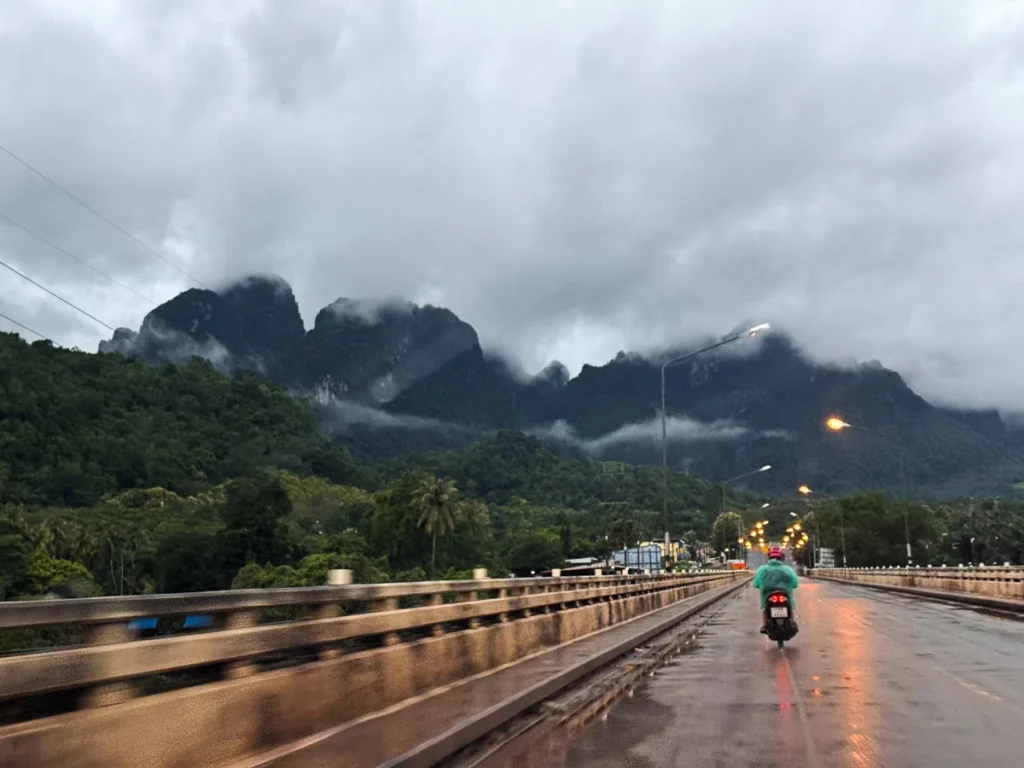A dramatic view of Thong Pha Phum during the rain.