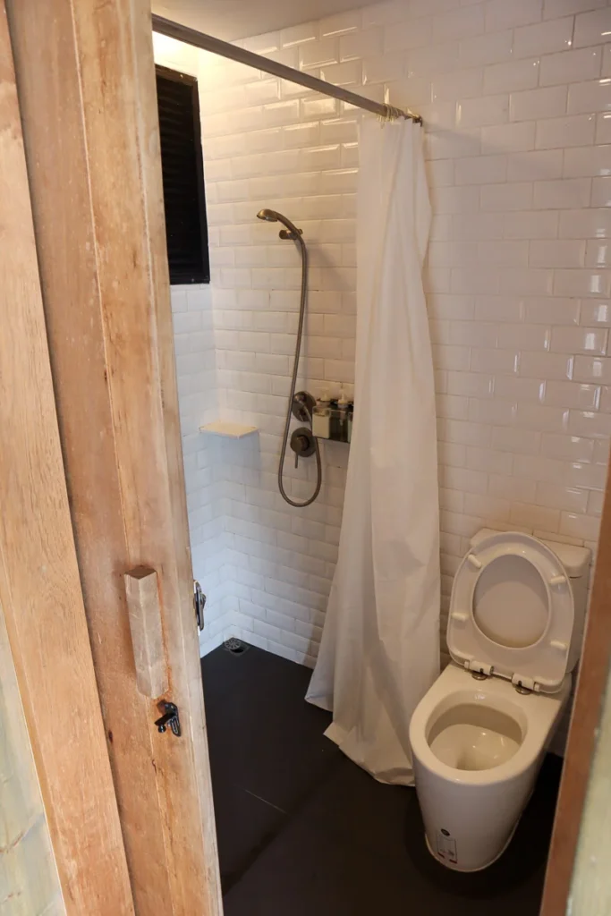 Toilet in a floating hotel room at Z9 Kanchanaburi standard room.