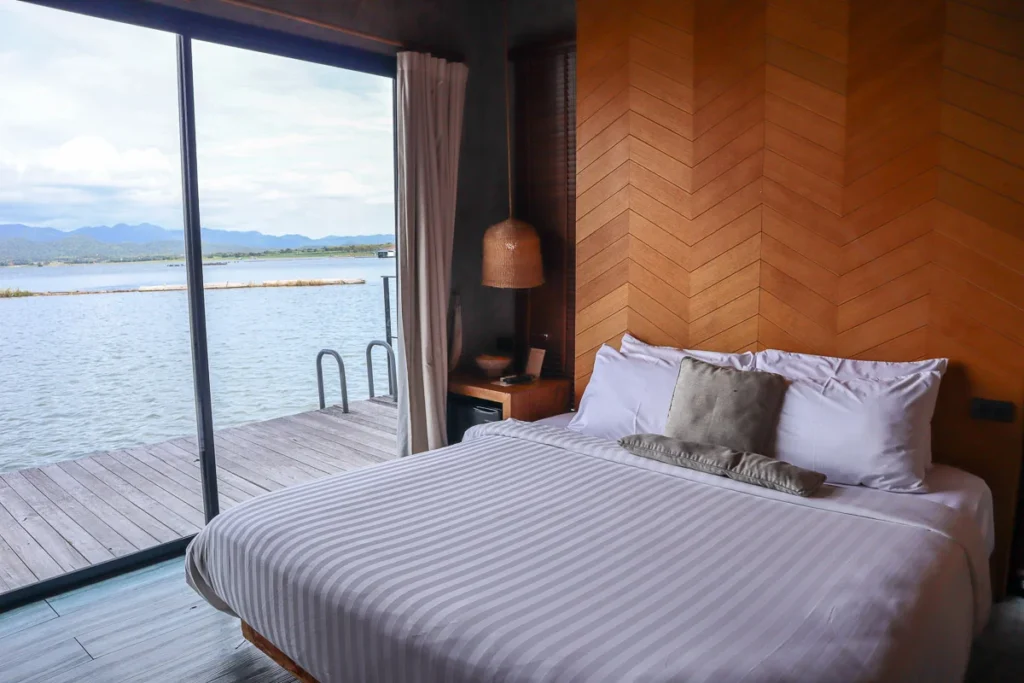 Waking up on a floating hotel in Kanchanaburi, Z9, to the water and mountains.